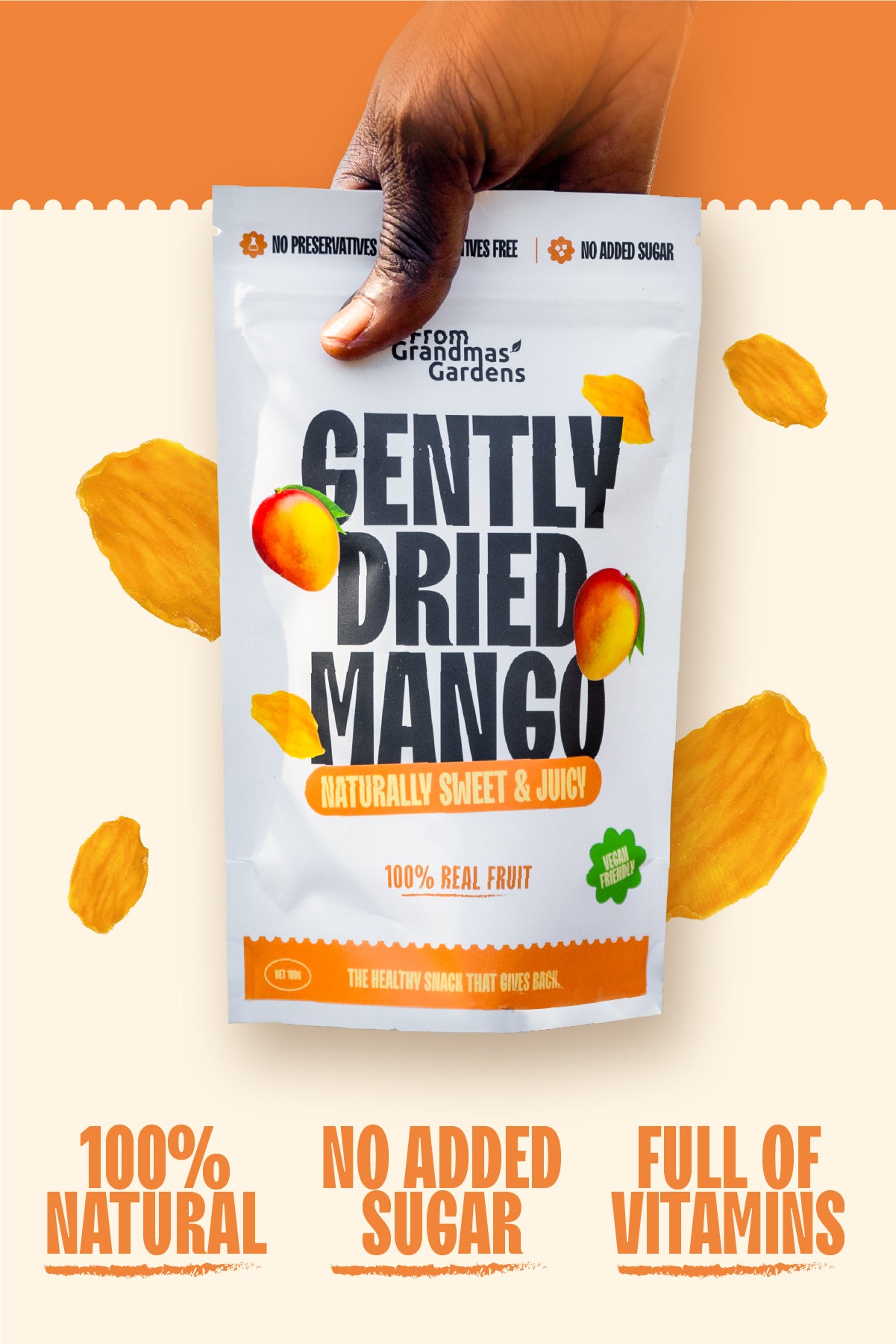 Packaging of Gently Dried Mango with a hand holding a pouch. The package has text highlighting key features such as 100% natural, no added sugar, and full of vitamins.