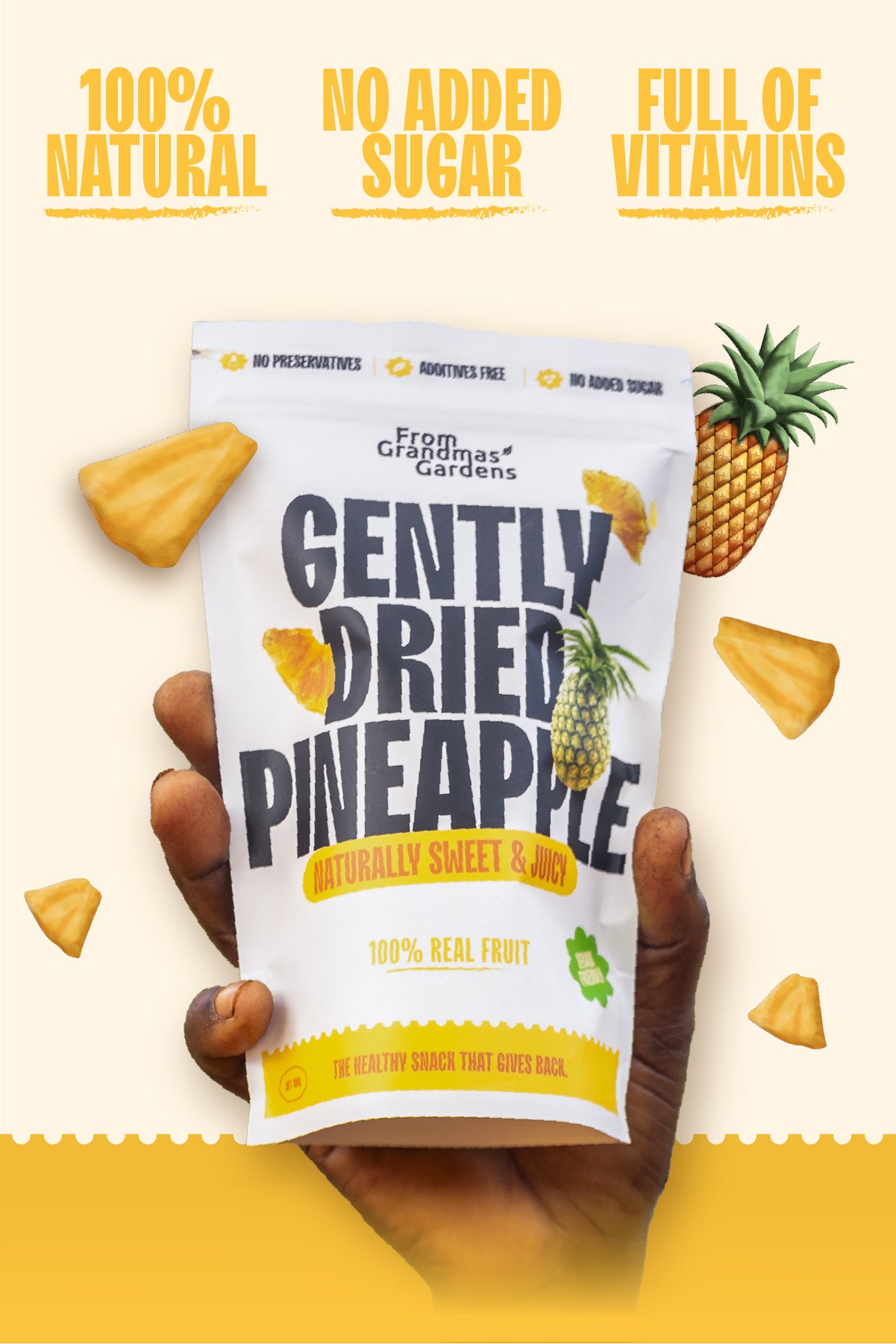 A packaged product of dried pineapple slices with the brand 'From Grandmas Garden' visible on the packaging. The image highlights the product as being 100% natural, GMO-free, and having no added sugar.